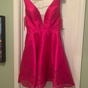 Pink cocktail dress with rhinestones added to the bodice